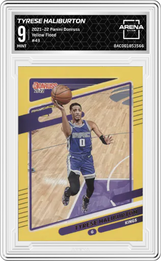 Tyrese Haliburton from the 2021-22 Panini Donruss set featuring a Yellow Flood parallel graded by Arena Club and given an overall grade of 9.