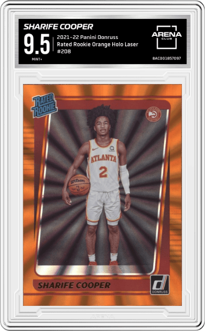 Sharife Cooper from the 2021-22 Panini Donruss set featuring a Orange Holo Laser parallel graded by Arena Club and given an overall grade of 9.5.