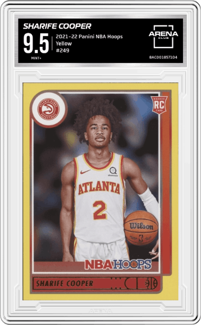 Sharife Cooper from the 2021-22 Panini NBA Hoops set featuring a Yellow parallel graded by Arena Club and given an overall grade of 9.5.