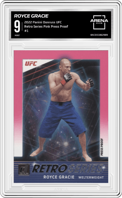 Royce Gracie from the 2022 Donruss UFC MMA set featuring a Press Proof Pink parallel graded by Arena Club and given an overall grade of 9.