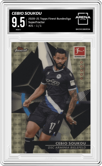 Cebio Soukou from the 2020-21 Topps Finest Bundesliga set featuring a SuperFractor  parallel graded by Arena Club and given an overall grade of 9.5.