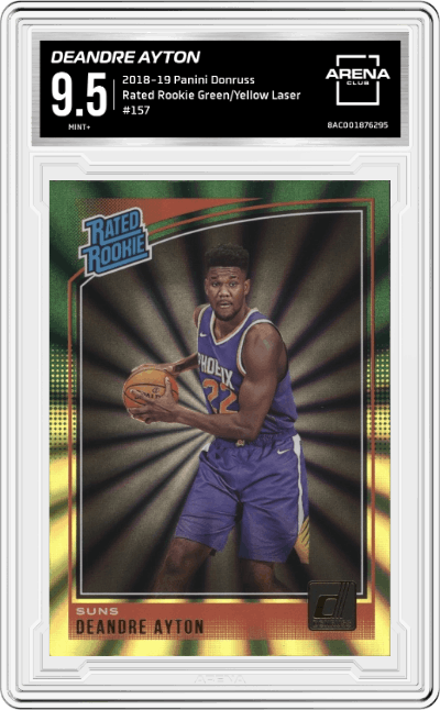 Deandre Ayton from the 2018-19 Panini Donruss  set featuring a Green/Yellow Laser parallel graded by Arena Club and given an overall grade of 9.5.