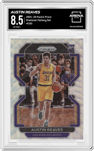 Austin Reaves from the 2021-22 Panini Prizm  set featuring a Premium Factory Set parallel graded by Arena Club and given an overall grade of 8.5.