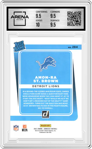 Amon-Ra St. Brown from the 2021 Panini Donruss set featuring a Press Proof Premium parallel graded by Arena Club and given an overall grade of 10.