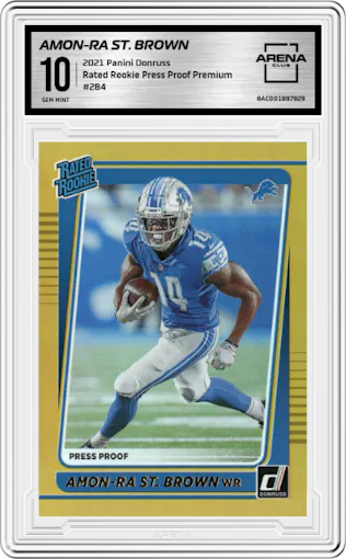 Amon-Ra St. Brown from the 2021 Panini Donruss set featuring a Press Proof Premium parallel graded by Arena Club and given an overall grade of 10.