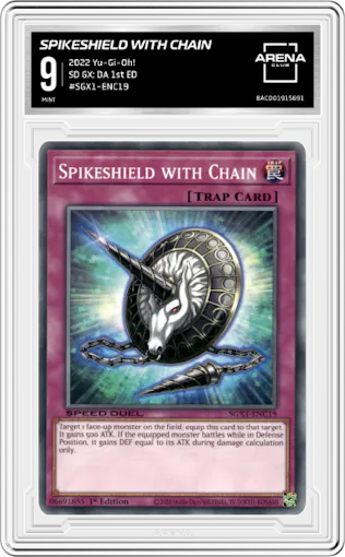 Spikeshield with Chain from the 2022 Yu-Gi-Oh! set graded by Arena Club and given an overall grade of 9.