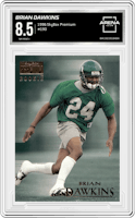 Brian Dawkins from the 1996 SkyBox Premium set graded by Arena Club and given an overall grade of 8.5.