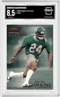 Brian Dawkins from the 1996 SkyBox Premium set graded by Arena Club and given an overall grade of 8.5.