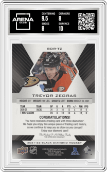 Trevor Zegras from the 2021-22 Upper Deck Black Diamond set graded by Arena Club and given an overall grade of 8.5.