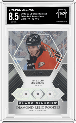 Trevor Zegras from the 2021-22 Upper Deck Black Diamond set graded by Arena Club and given an overall grade of 8.5.