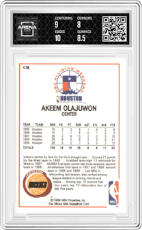 Akeem Olajuwon from the 1989-90 NBA Hoops  set graded by Arena Club and given an overall grade of 8.5.