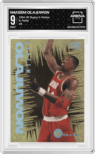 Hakeem Olajuwon from the 1994-95 Skybox E-Motion set graded by Arena Club and given an overall grade of 9.