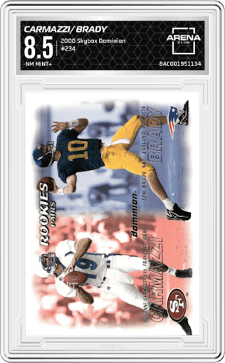 Giovanni Carmazzi/Tom Brady from the 2000 Skybox Dominion set graded by Arena Club and given an overall grade of 8.5.