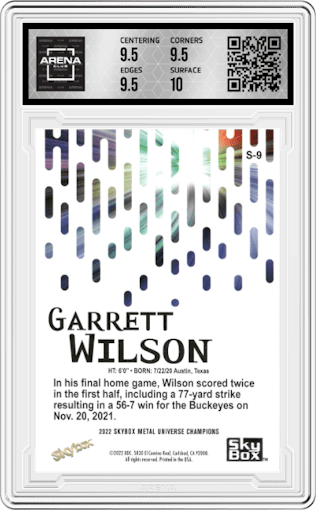 Garrett Wilson from the 2022 Skybox Metal Universe Champions Multi-Sport set graded by Arena Club and given an overall grade of 10.