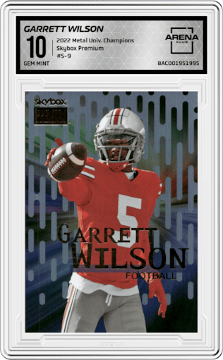 Garrett Wilson from the 2022 Skybox Metal Universe Champions Multi-Sport set graded by Arena Club and given an overall grade of 10.