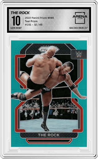 The Rock from the 2022 Panini Prizm WWE Debut Edition  set featuring a Teal Prizm  parallel graded by Arena Club and given an overall grade of 10.