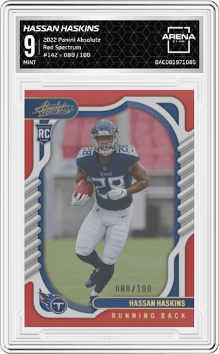 Hassan Haskins from the 2022 Panini Absolute set featuring a Red Spectrum parallel graded by Arena Club and given an overall grade of 9.
