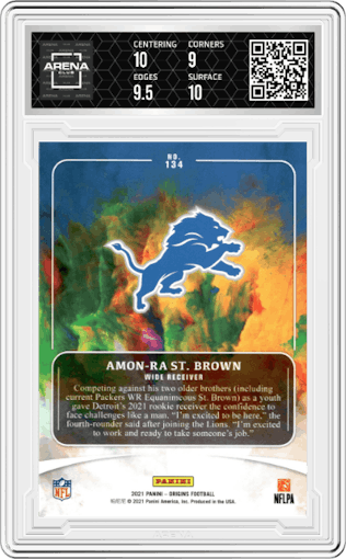 Amon-Ra St. Brown from the 2021 Panini Origins set graded by Arena Club and given an overall grade of 9.5.