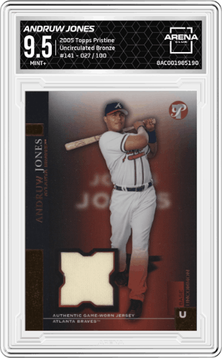 Andruw Jones from the 2005 Topps Pristine set featuring a Uncirculated Bronze parallel graded by Arena Club and given an overall grade of 9.5.