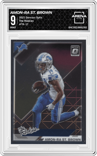 Amon-Ra St. Brown from the 2021 Panini Donruss Optic set graded by Arena Club and given an overall grade of 9.