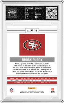 Brock Purdy from the 2022 Panini Chronicles set featuring a Pink parallel graded by Arena Club and given an overall grade of 9.5.