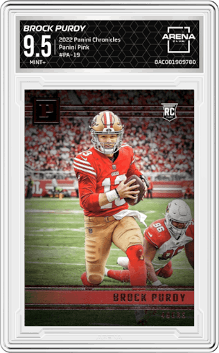 Brock Purdy from the 2022 Panini Chronicles set featuring a Pink parallel graded by Arena Club and given an overall grade of 9.5.