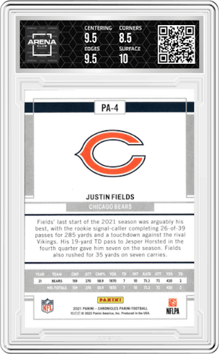 Justin Fields from the 2021 Panini Chronicles set featuring a Pink parallel graded by Arena Club and given an overall grade of 9.
