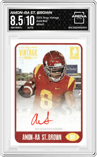 Amon-Ra St. Brown from the 2021 Onyx Vintage set featuring a Red parallel graded by Arena Club and given an overall grade of 8.5.