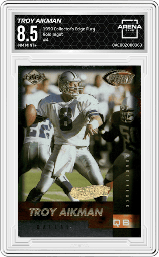 Troy Aikman from the 1999 Collector's Edge Fury set featuring a Gold Ingot parallel graded by Arena Club and given an overall grade of 8.5.