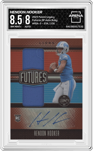 Hendon Hooker from the 2023 Panini Legacy set featuring a Ruby parallel graded by Arena Club and given an overall grade of 8.5.