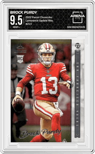 Brock Purdy from the 2022 Panini Chronicles set graded by Arena Club and given an overall grade of 9.5.