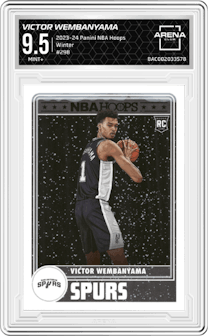 Victor Wembanyama from the 2023-24 Panini NBA Hoops set featuring a Winter parallel graded by Arena Club and given an overall grade of 9.5.