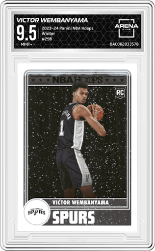 Victor Wembanyama from the 2023-24 Panini NBA Hoops set featuring a Winter parallel graded by Arena Club and given an overall grade of 9.5.