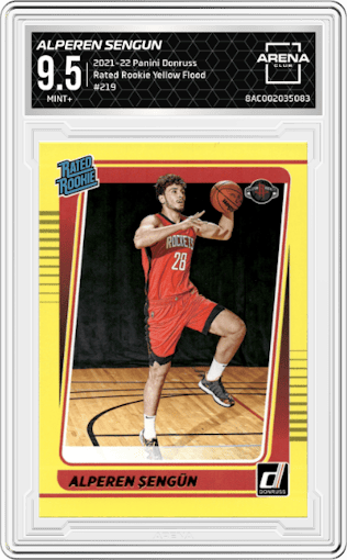 Alperen Sengun from the 2021-22 Panini Donruss set featuring a Yellow Flood parallel graded by Arena Club and given an overall grade of 9.5.