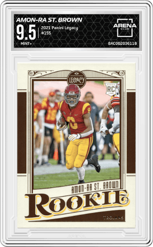 Amon-Ra St. Brown from the 2021 Panini Legacy set graded by Arena Club and given an overall grade of 9.5.