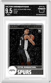 Victor Wembanyama from the 2023-24 Panini NBA Hoops set featuring a Winter parallel graded by Arena Club and given an overall grade of 9.5.