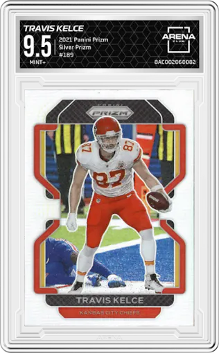 Travis Kelce from the 2021 Panini Prizm set featuring a Silver Prizm parallel graded by Arena Club and given an overall grade of 9.5.