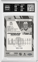 Connor Bedard from the 2023-24 O-Pee-Chee set featuring a Black Rainbow parallel graded by Arena Club and given an overall grade of 9.
