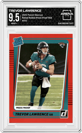 Trevor Lawrence from the 2021 Panini Donruss set featuring a Press Proof Red parallel graded by Arena Club and given an overall grade of 9.5.
