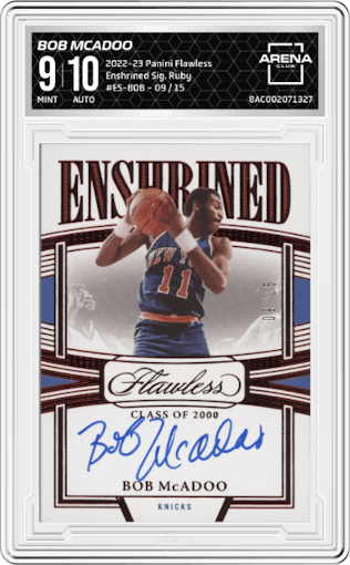 Bob McAdoo from the 2022-23 Panini Flawless set featuring a Ruby parallel graded by Arena Club and given an overall grade of 9.