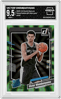 Victor Wembanyama from the 2023-24 Panini Donruss set featuring a Green Holo Laser  parallel graded by Arena Club and given an overall grade of 9.5.