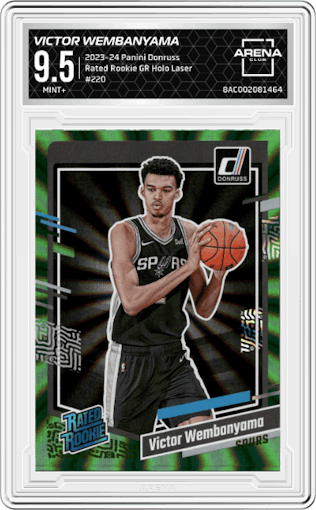 Victor Wembanyama from the 2023-24 Panini Donruss set featuring a Green Holo Laser  parallel graded by Arena Club and given an overall grade of 9.5.