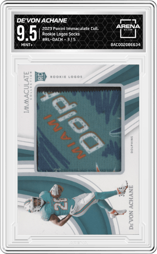 De'Von Achane from the 2023 Panini Immaculate Collection  set featuring a Socks parallel graded by Arena Club and given an overall grade of 9.5.