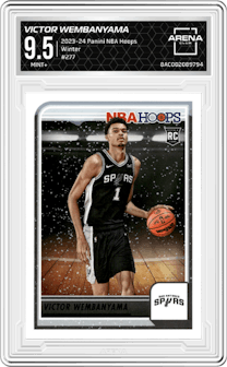 Victor Wembanyama from the 2023-24 Panini NBA Hoops set featuring a Winter parallel graded by Arena Club and given an overall grade of 9.5.