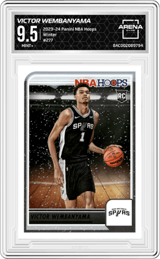 Victor Wembanyama from the 2023-24 Panini NBA Hoops set featuring a Winter parallel graded by Arena Club and given an overall grade of 9.5.