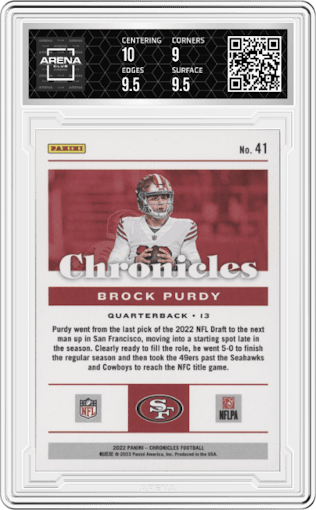 Brock Purdy from the 2022 Panini Chronicles set featuring a Pink parallel graded by Arena Club and given an overall grade of 9.5.