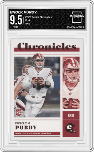Brock Purdy from the 2022 Panini Chronicles set featuring a Pink parallel graded by Arena Club and given an overall grade of 9.5.