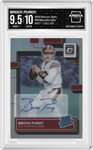 Brock Purdy from the 2022 Panini Donruss Optic set featuring a Holo parallel graded by Arena Club and given an overall grade of 9.5.