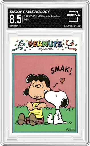 Snoopy Kissing Lucy from the 1991 Tuff Stuff Peanuts Preview set graded by Arena Club and given an overall grade of 8.5.