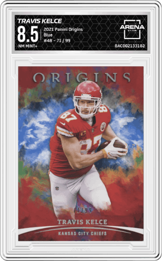 Travis Kelce from the 2021 Panini Origins set featuring a Blue parallel graded by Arena Club and given an overall grade of 8.5.